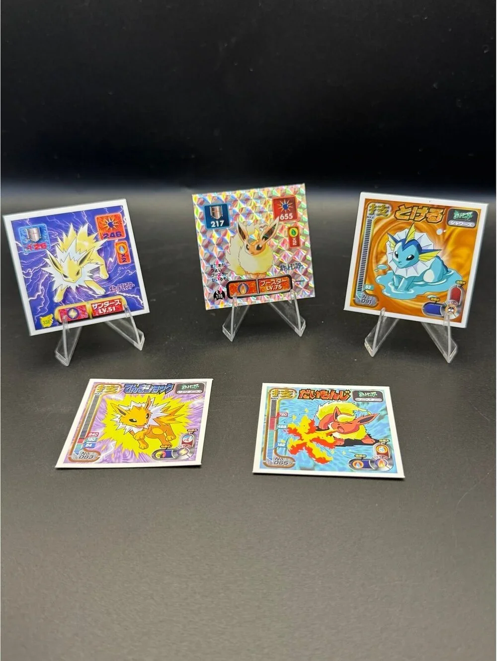 Vintage Japanese Pokémon Eeveelution sticker lot featuring Jolteon, Flareon, and